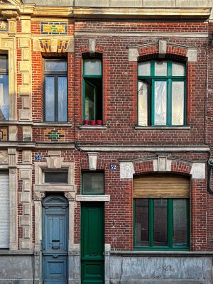 Brick façade of two houses side by side in the Trichon district